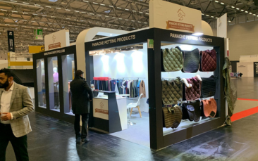 APPLIED trade show booth by Expo Creators with expert fabrication services, modern white display design, and storage for expos.